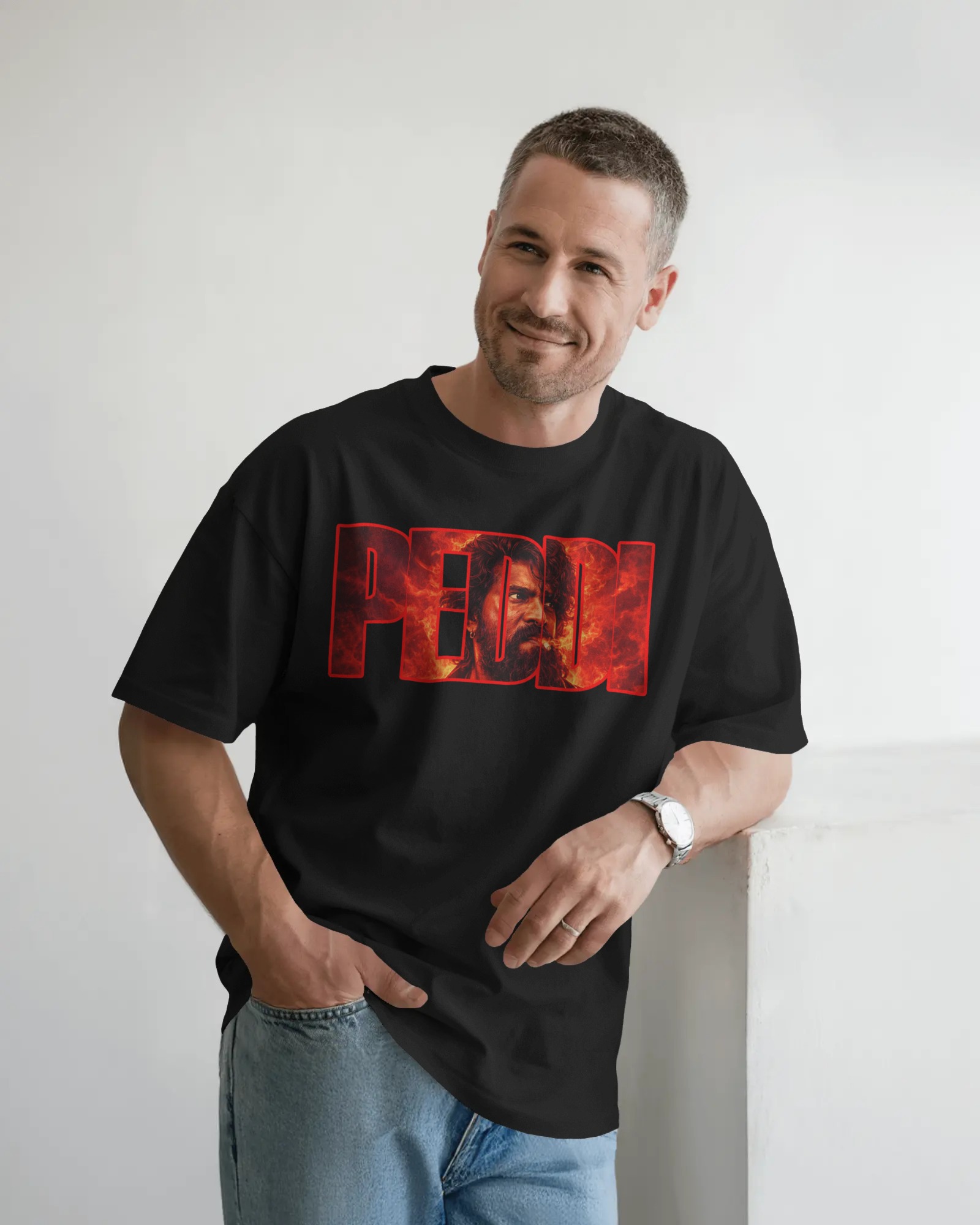 Peddi Ram Charan fire typography front graphic black t shirt with bold red PEDDI text